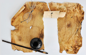 Document Restoration an old tattered piece of parchment paper with glasses and restoration tools resting nearby